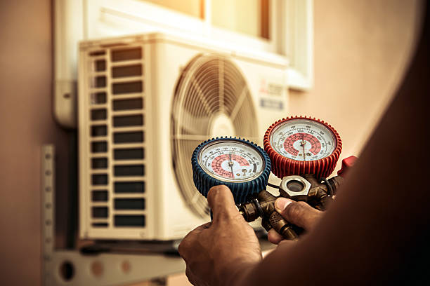 Professional Heat Pump Repair technician working in Springfield, IL